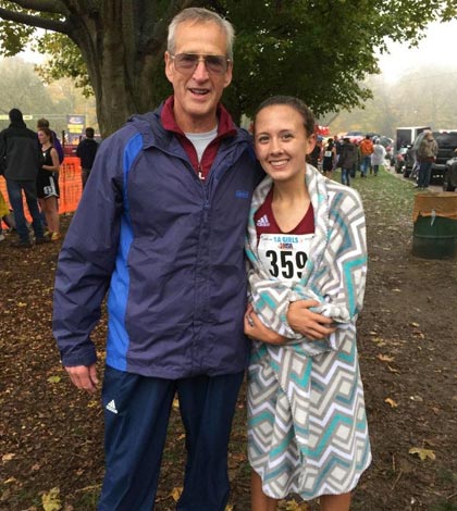 Pictured with Gibault cross country coach and principal Russ Hart is freshman runner Brooke Biffar following her state run Saturday in Peoria. (submitted photo)
