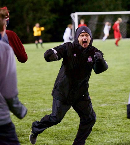 Gibault head soccer coach Darryn Haudrich celebrates during his team's dramatic 1-0 win over Chatham-Glenwood in the Springfield Supersectional. (John Hooser photo)