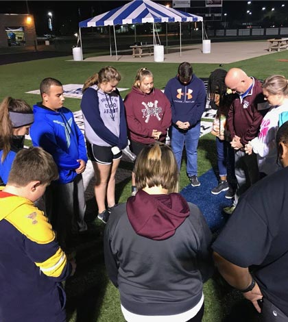 Pictured, the Dupo Fellowship of Christian Athletes huddle was formed in September. (submitted photo)