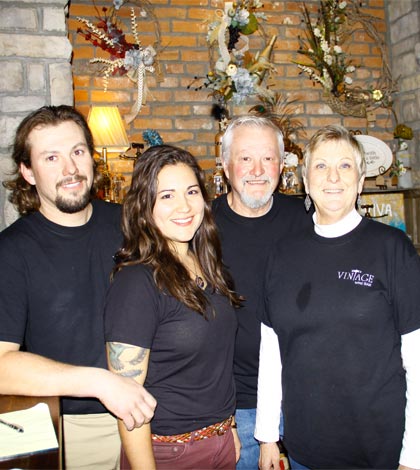 Pictured inside the new Vintage Wine Bar in Waterloo, from left, are owners Justin, Britney, Lonny and Pat Schmidt. 
(Kermit Constantine photo)