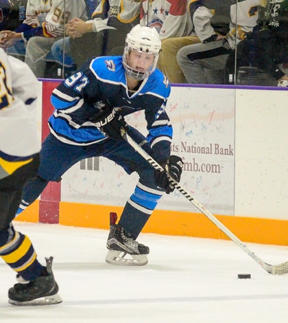 Columbia's Cam Nowak skates with the puck during a game earlier this season.