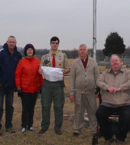 Pictured, from left, are Palmier Cemetery Board trustee Jim Lansing, Charlotte Romano, Millstadt Troop 622 Boy Scout Andrew Romano, Palmier Cemetery Board President Don Gergen and retired trustee Vernon Ritter. Andrew is holding up the list of burials with GPS coordinates. Not pictured is trustee Kevin Koenigstein. (Sean McGowan photo)