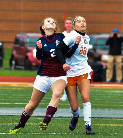 Pictured, Gibault's Hannah Stearns and Waterloo's Emma Novack battle for the ball during Saturday's rivalry soccer showdown. (John Spytek photo)
