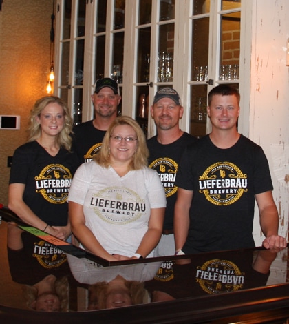 Lieferbräu Brewery in Red Bud is opening June 30. The brewery is owned by members of the Liefer family. Pictured, from left, are partners Kara Wagner, Stephanie Liefer, Kent Liefer, Kirk Liefer and Kris Liefer. (James “Tal” Moss photo)