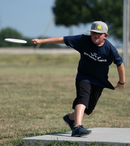 Vincent Goodman hurls a disc at the Professional Disc Golf Association Junior World Disc Golf Championships. 
(submitted photo)