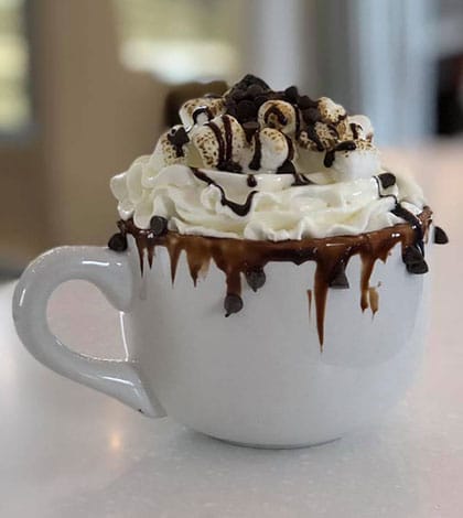 Pictured is a cup of Coffee Mill Café’s hot chocolate. 