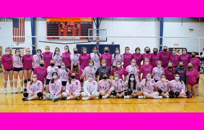 Volleyball rivalry goes pink for a night