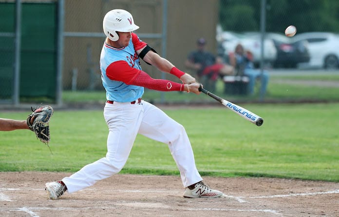St. Clair All Star Matt Reinholtz of Valmeyer makes contact with the pitch at the Mon Clair All Star game at Whitey Herzog Field in Belleville, Illinois on Wednesday July 14, 2021. Paul Baillargeon