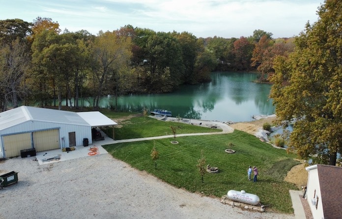 An aerial view of Richard Melching Sr.’s property shows a wheelchair accessible ramp leading to the large pond.