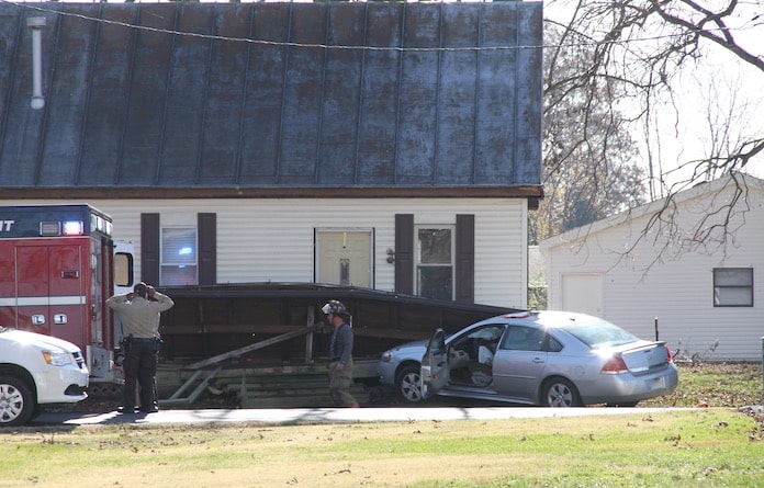 Vehicle crashes into front porch of Hecker home