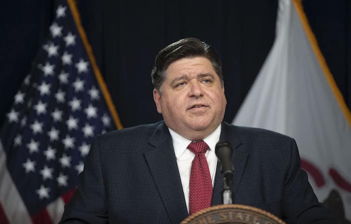 Gov. J.B. Pritzker gives his daily briefing about the coronavirus pandemic Sunday, March 22, 2020 from the Thompson Center. (Brian Cassella/Chicago Tribune)