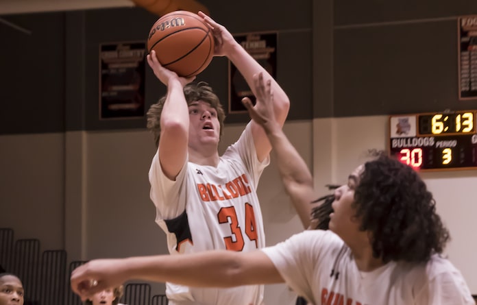 Boys hoopsters open strong in regionals