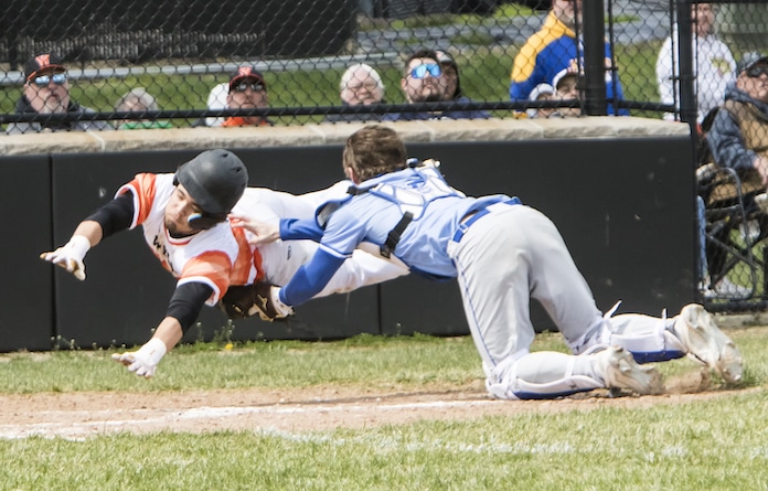 WHS-Josh-Dluhy-safe-at-home-chs-catcher-Brennan-Weik-ball-was-dropped
