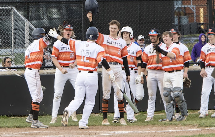 1F1A4528.jpg-Nate-Phillips-is-greeted-after-hitting-a-dinger