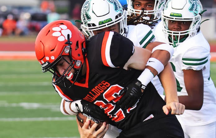 Nathan Lloyd (26) of Waterloo picks up additional yardage against St. Marys on Friday, September , 8, 2023 at Waterloo High School in Waterloo, Illinois. Paul Baillargeon