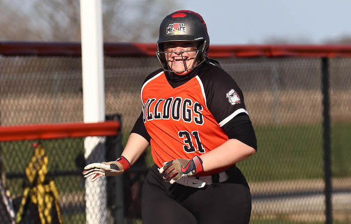Raelyn Melching (31) of Waterloo runs to home plate after a grand slam in their game against New Athens on Wednesday, March 27, 2024 at Waterloo High School.