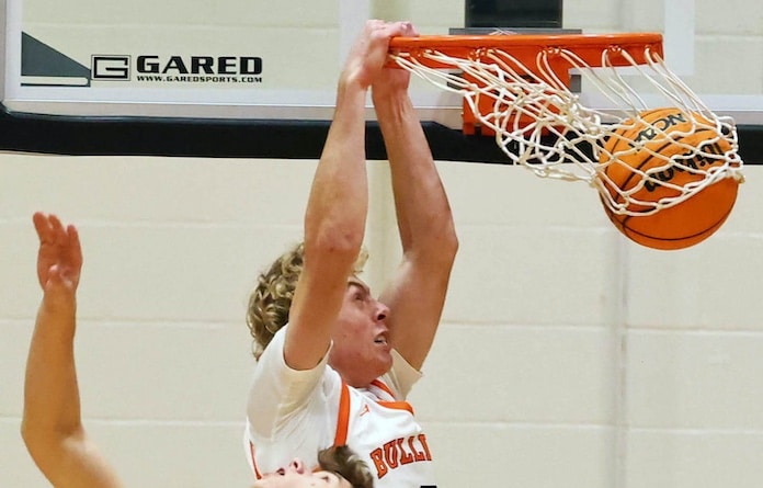Max Oswald (2) of Waterloo goes up for the slam dunk against Gibault at Waterloo High School on Monday February 17, 2025.