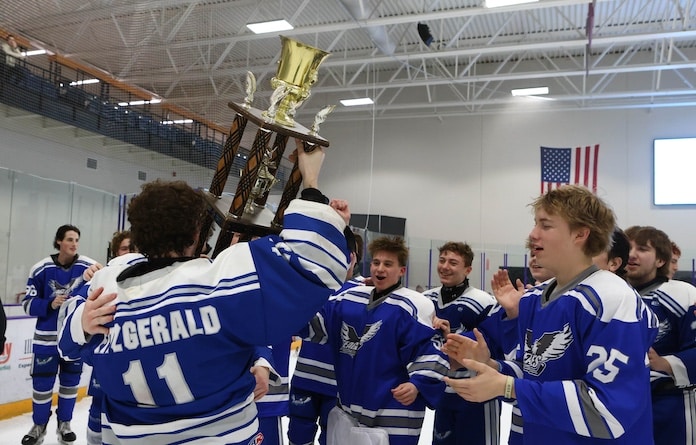 Dalton Fitzgerald (11) of Columbia skates to his team with the after defeating Alton 4-0 in the Varsity 1A MVCHA finals at the McKendree Metro Rec Plex in O'Fallon on Thursday February 27, 2025.