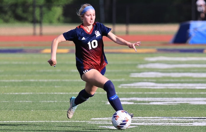 Emily Richardson (10) of Gibault dribbles the ball against Massac County in the Class 1A Gibault regional soccer match against Massac County High School at Althoff High School in Belleville, Illinois on Friday, May 10, 2024.