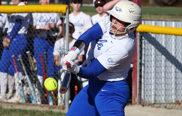 Sam Augustine (21) of Columbia puts the ball in play against Gibault at Gibault High School in Waterloo on Monday March 17, 2025.