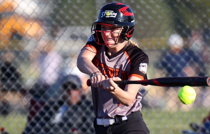 Grayce Mayer (4) of Waterloo slaps the ball to the ground against O'Fallon at the O'Fallon Millburn Campus on Wednesday March 26, 2025.