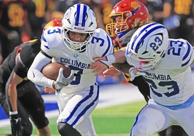 Jackson Lawal (3) gets help from Cooper Weik (23) and will score a touchdown against Roxana at Roxana High School on Friday September 19, 2025.