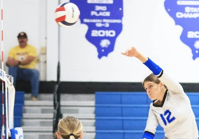 Ava Mathews (12) hits a shot towards the net against East Alton Wood River at Columbia High School on Tuesday September 9, 2025.