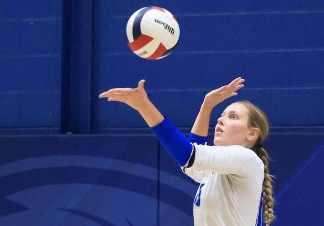 Maura Kohlenberger (15) of Columbia serves against East Alton Wood River at Columbia High School on Tuesday September 9, 2025.