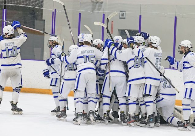 The Ice Eagles celebrate a hard earned win over Waterloo-Freeburg to advance to the Finals of the MVCHA next Tuesday back at the McKendree Metro Rec Plex on Thursday. Paul Baillargeon