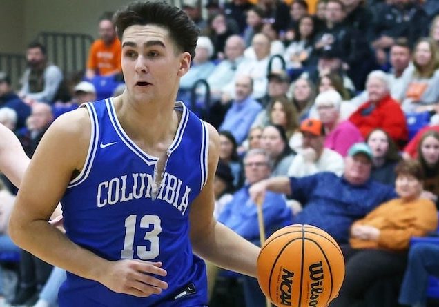 Eddie Smagic (13) of Columbia drives to the basket against Wesclin in the championship game of the Okawville Invitational Basketball Tournament at Okawville High School on Saturday January 25, 2025.