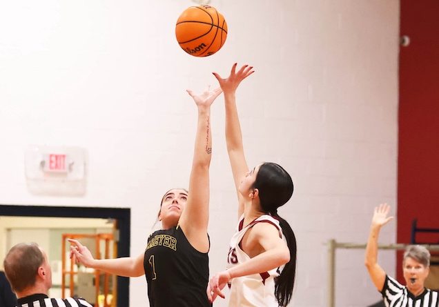 Kaleigh Hicks (1) of Valmeyer and Karmon Grohmann (12) of Gibault jump for the opening tip in a non conference girls basketball game at Gibault Catholic High School in Waterloo, Illinois on Tuesday January 20; 2026. Paul Baillargeon