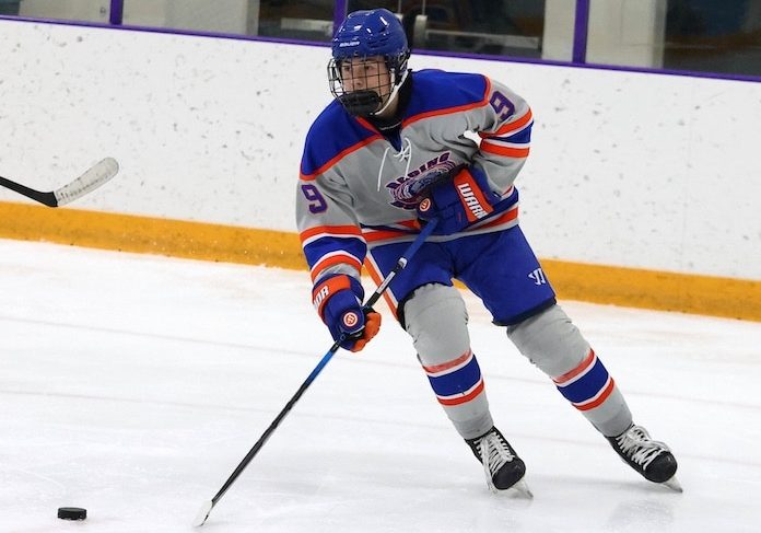 Ryder Neff (9) of Waterloo moves the puck up the ice against Collinsville in a MVCHS hockey game at the McKendree Metro Rec Plex on Thursdsay, December 5, 2024 Paul Baillargeon