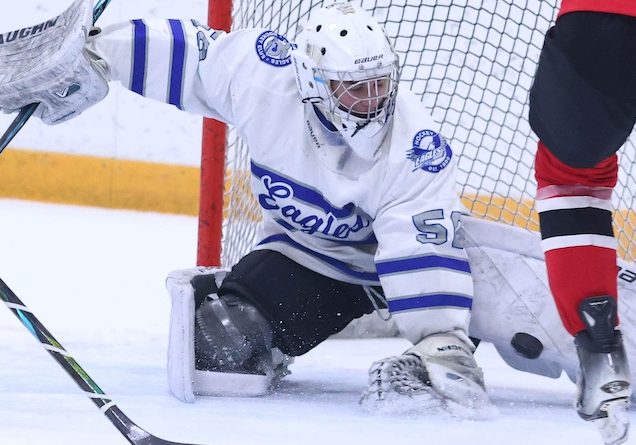Ryder Kelly (50) of Columbia makes another pad save against Highland at the McKendree Metro Rec Plex on Tuesday December 23, 2025. Paul Baillargeon